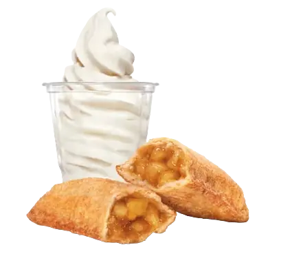 Soft serve vanilla ice cream cup next to a sliced apple pie.Soft serve vanilla ice cream cup next to a sliced apple pie.