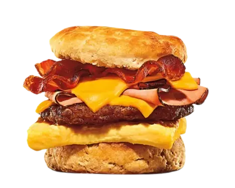 Loaded breakfast biscuit with sausage, bacon, ham, and cheese.