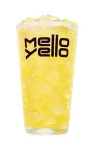 A glass of bright yellow Mello Yello soda with ice.