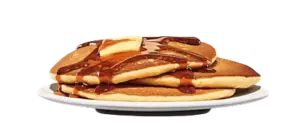 A stack of three fluffy, golden brown pancakes on a white plate, topped with butter and drizzled with sweet syrup.