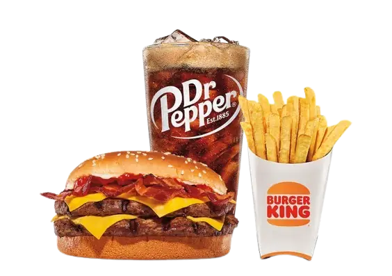 A Burger King bacon double cheeseburger served with a large glass of Dr Pepper and a side of golden French fries.