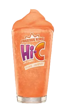 Pink Frozen Fanta Strawberry slushy drink in a glass.