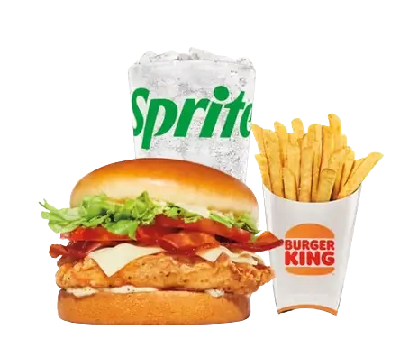 A Royal Crispy Chicken sandwich with bacon, swiss cheese, and lettuce, paired with a cold Sprite and French fries.