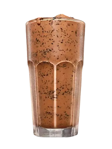 Thick chocolate Oreo milkshake showing fine cookie bits.